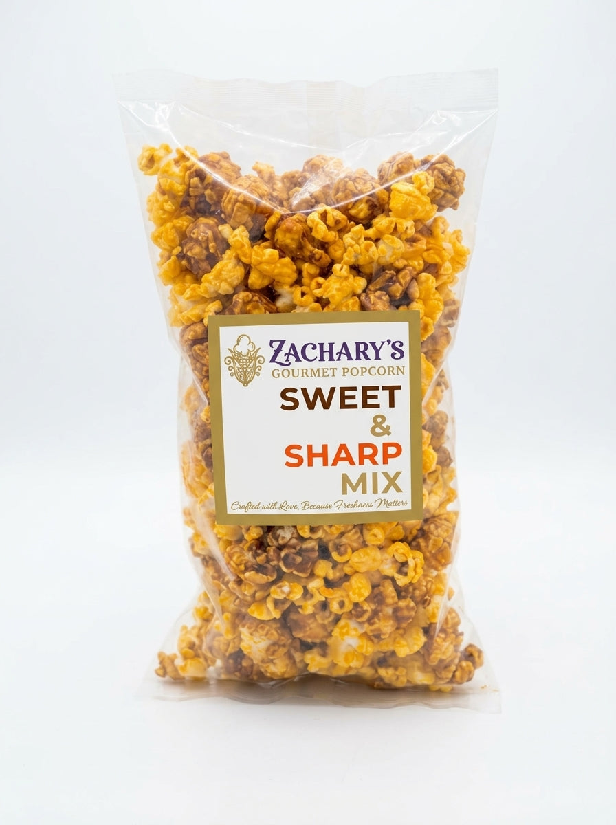 A clear plastic bag of Zachary's Gourmet Popcorn in the Sweet & Sharp Mix, showing the golden-brown and yellow popcorn inside, set against a plain white background.
