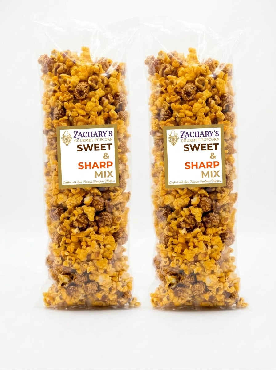 Two clear plastic bags of Zachary's Sweet & Sharp Mix popcorn standing side by side on a white background.