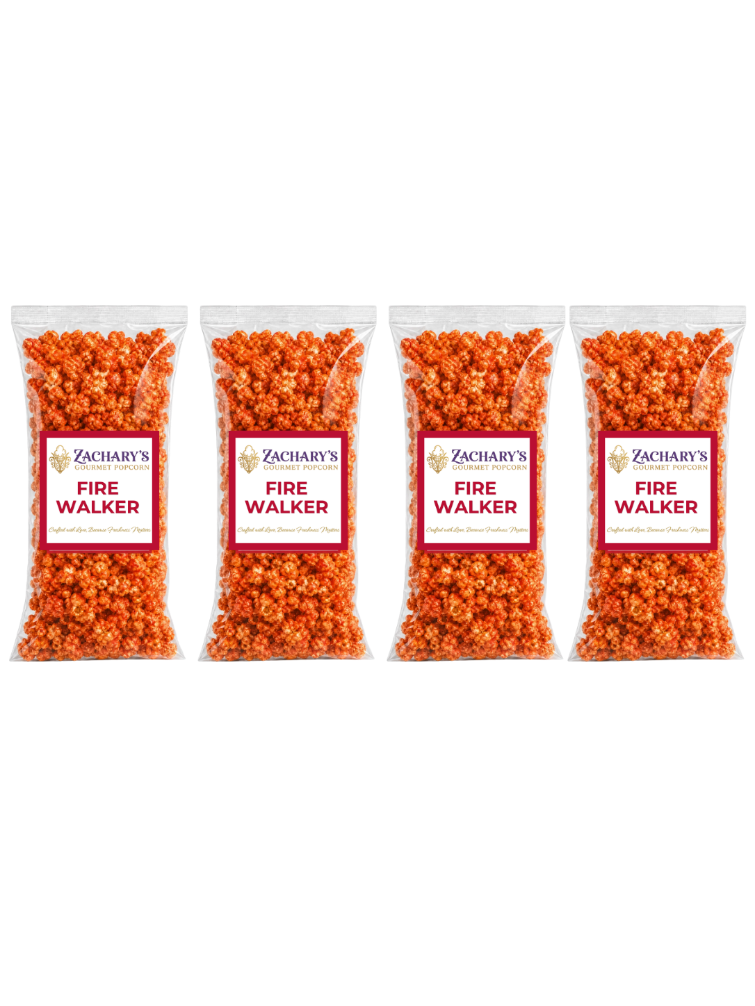 Four bags of Zachary's Fire Walker gourmet popcorn in a row, orange spicy-coated kernels in clear bags with red and white labels